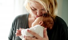 Your Skin - Mother kissing baby Your Skin - Mother kissing baby